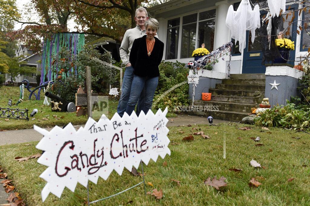 Michael Perez Carol McCarthy and her husband, Tom, pose for a portrait at their home they decorated for Halloween, Monday, Oct. 26, 2020, in Palmyra, N.J. (AP Photo/Michael Perez)