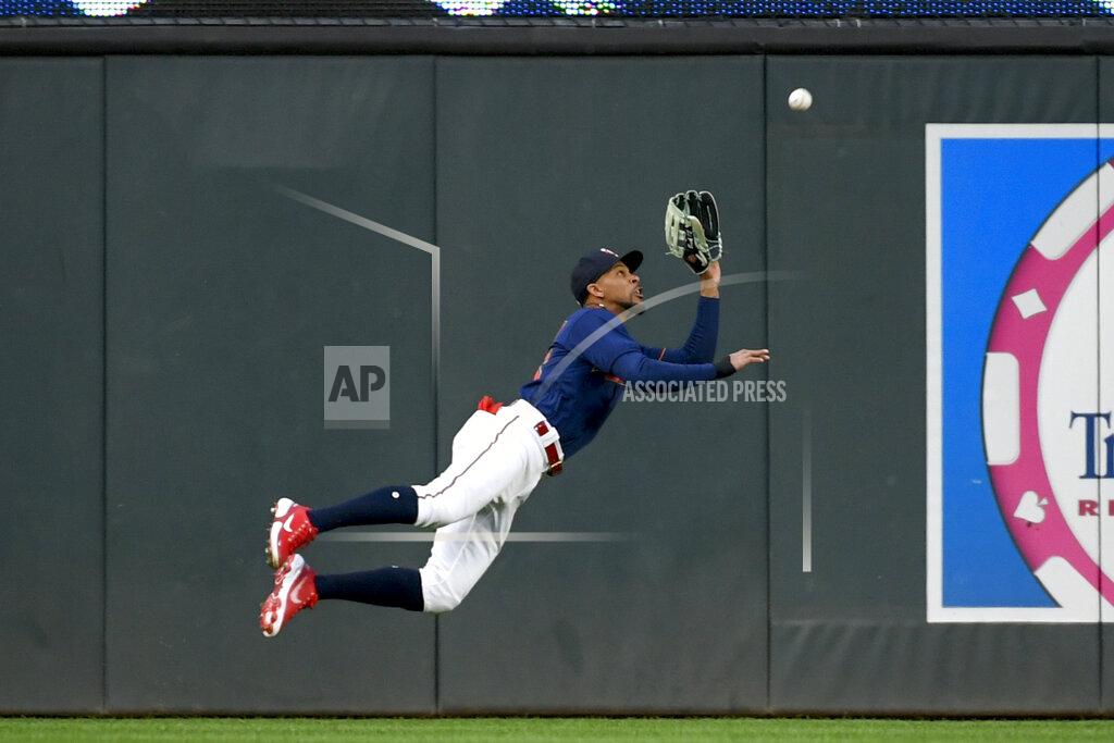 Craig Lassig Minnesota Twins center fielder Byron Buxton makes a diving catch for the out on a fly ball hit by Detroit Tigers' Javier Candelario during the fourth inning of a baseball game Tuesday, May 24, 2022, in Minneapolis. (AP Photo/Craig Lassig)