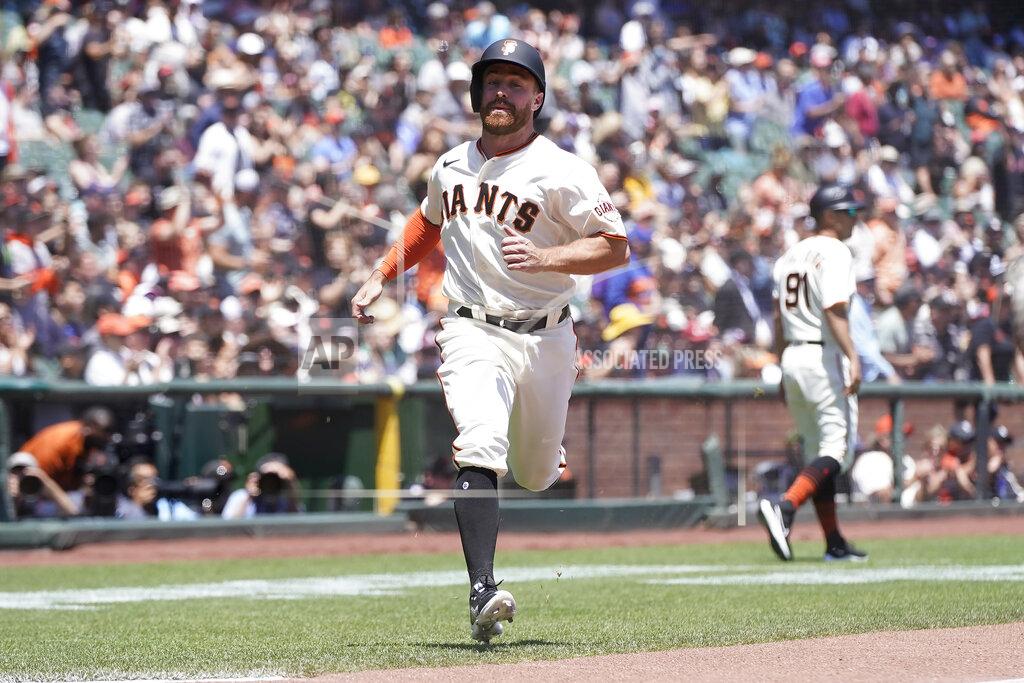 Jeff Chiu San Francisco Giants' Donovan Walton scores against the New York Mets during the second inning of a baseball game in San Francisco, Wednesday, May 25, 2022. (AP Photo/Jeff Chiu)