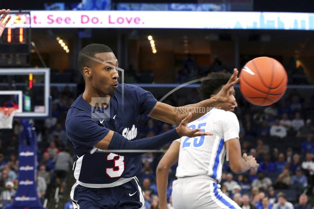 Karen Pulfer Focht Jackson State guard Jonas James (3) passes the ball to his teammate in the first half of an NCAA college basketball game against Memphis Saturday, Dec. 21, 2019, in Memphis, Tenn. (AP Photo/Karen Pulfer Focht)