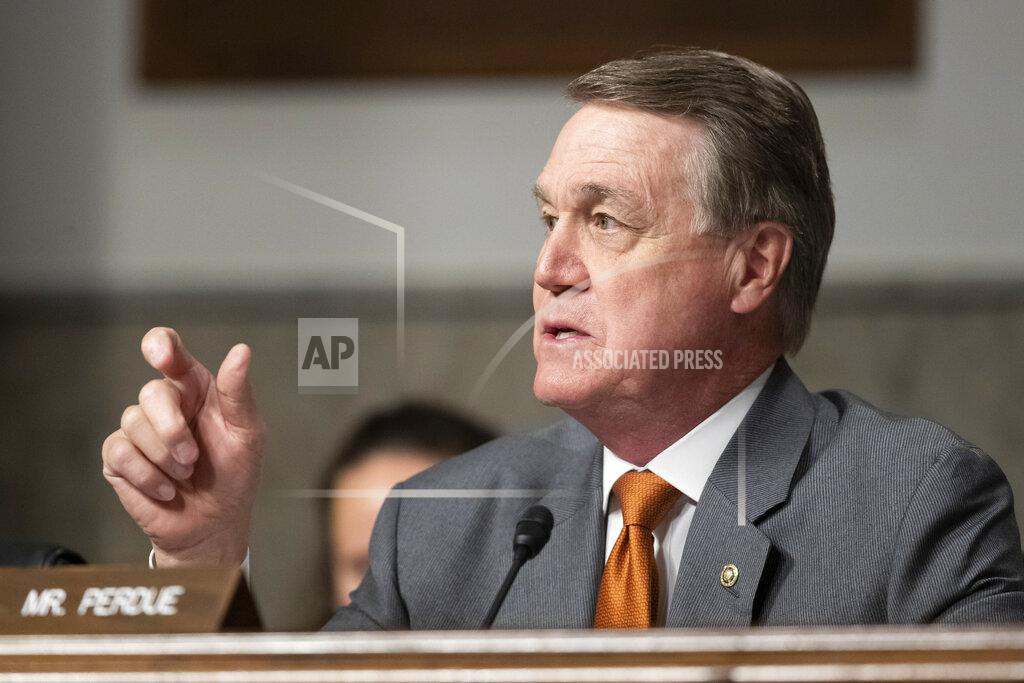 Alex Brandon FILE - In this Dec. 3, 2019, file photo, Sen. David Perdue, R-Ga., speaks during a hearing of the Senate Armed Services Committee in Washington. The Democratic candidates vying to take on Perdue in November square off in a primary election Tuesday, June 9, after weeks of delay caused by the coronavirus pandemic. (AP Photo/Alex Brandon, File)