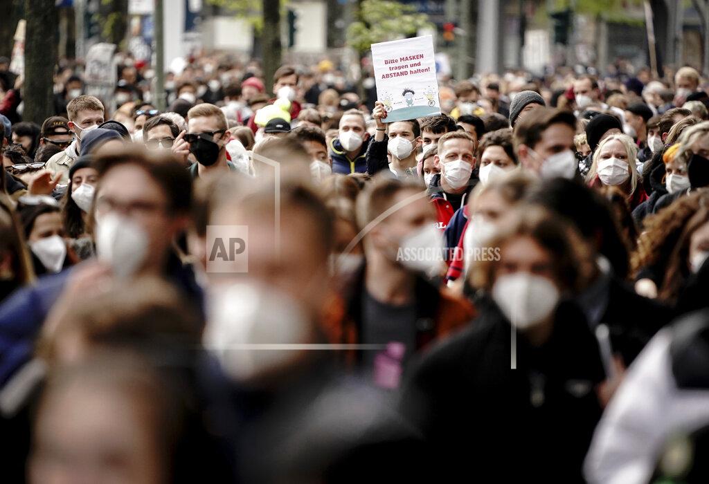 Kay Nietfeld Participants demonstrate on May 1 "For the revival of the cultural and club scene, through the creative use of public space." in Berlin, Germany, Saturday, May 1, 2021. (Kay Nietfeld/dpa via AP)
