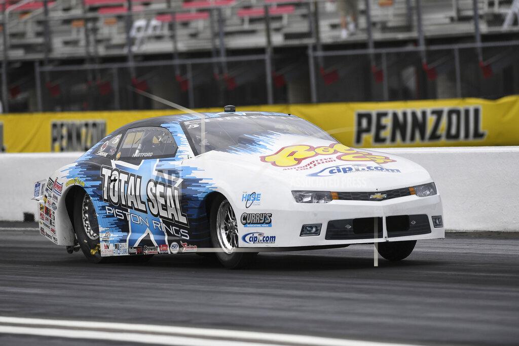 Gary Nastase In this photo provided by the NHRA, Pro Stock driver Matt Hartford coasts to his second victory at the Mopar Express Lane NHRA SpringNationals at Houston Raceway Park in Baytown, Texas, when he defeated Deric Kramer in the final round Monday, May 24, 2021. (Gary Nastase/Auto Imagery via AP)