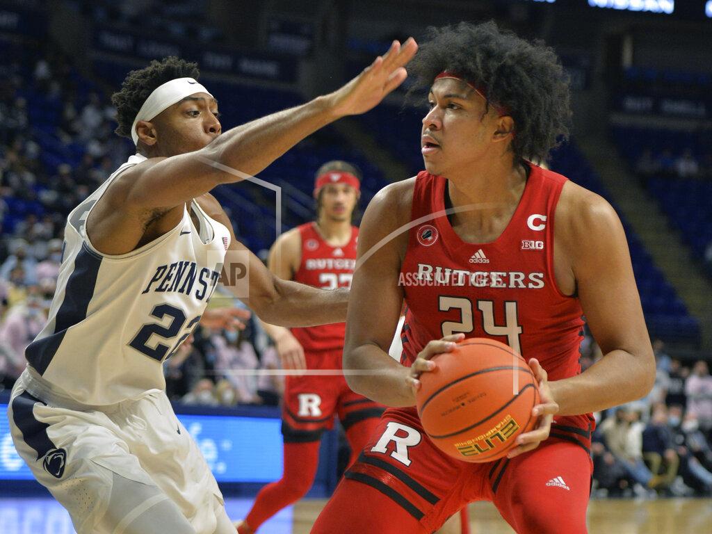 Gary M. Baranec Rutgers Ron Harper, Jr. (24) moves the ball on the baseline against Penn State's Jalen Pickett (22) in the first half of an NCAA college basketball game Tuesday, Jan 11, 2022, in State College, Pa. (AP Photo/Gary M. Baranec)