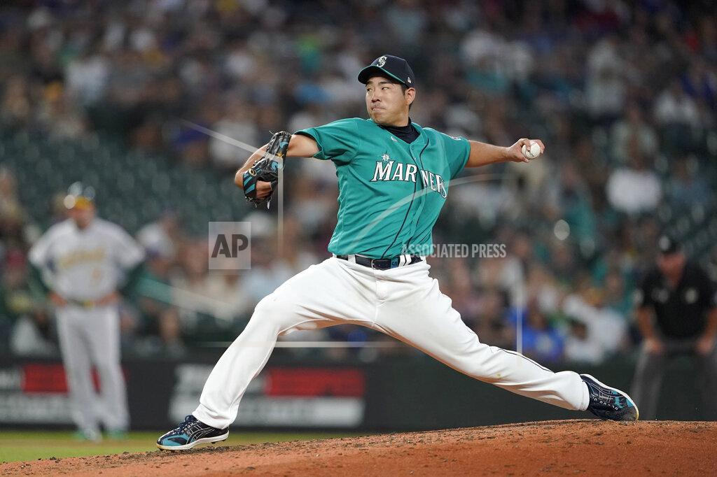 Ted S. Warren Seattle Mariners starting pitcher Yusei Kikuchi throws to an Oakland Athletics batter during the sixth inning of a baseball game Friday, July 23, 2021, in Seattle. (AP Photo/Ted S. Warren)