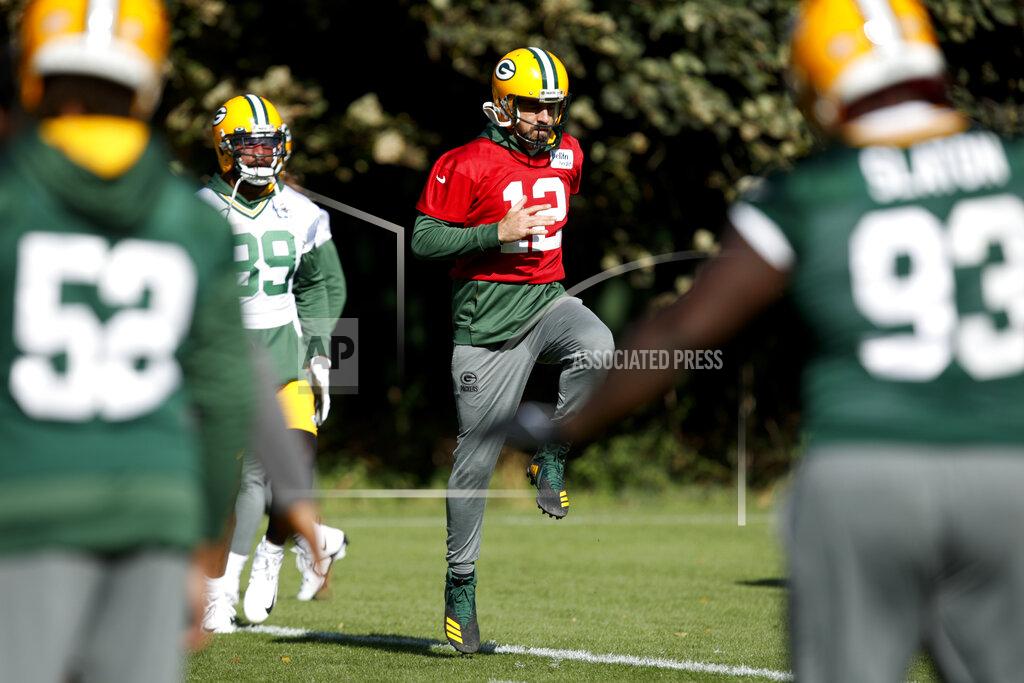 David Cliff Green Bay Packers quarterback Aaron Rodgers trains at The Grove in Chandler's Cross, England, Friday, Oct. 7, 2022 ahead the NFL game against New York Giants at the Tottenham Hotspur stadium on Sunday. (AP Photo/David Cliff)