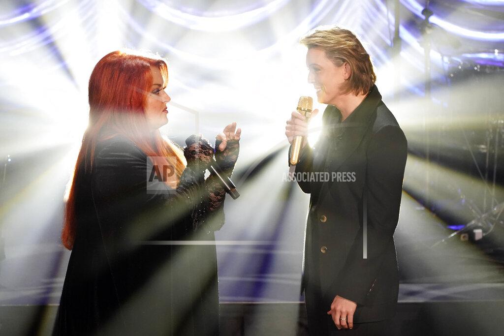 Mark Humphrey Wynonna Judd, left, and Brandi Carlile sing "The Rose," during a tribute to country music star Naomi Judd, Sunday, May 15, 2022, in Nashville, Tenn. Naomi Judd died April 30. She was 76. (AP Photo/Mark Humphrey)