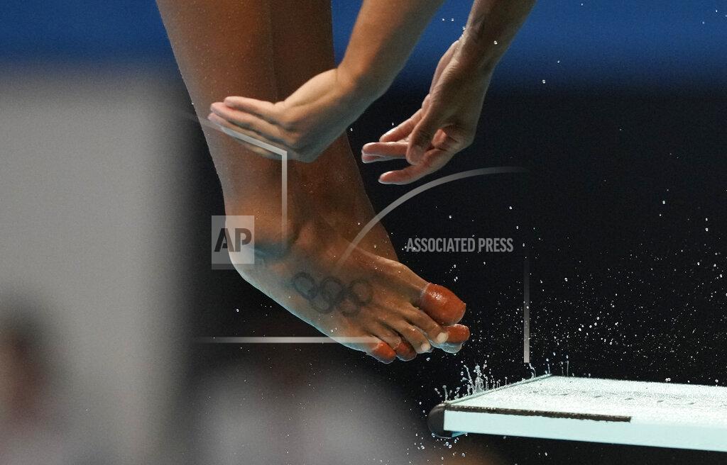 Dmitri Lovetsky Jennifer Abel of Canada competes in women's diving 3-meter springboard final at the Tokyo Aquatics Centre at the 2020 Summer Olympics, Sunday, Aug. 1, 2021, in Tokyo, Japan. (AP Photo/Dmitri Lovetsky)