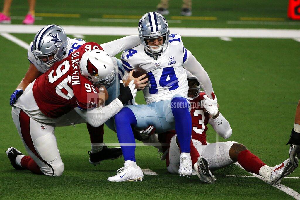 Michael Ainsworth Arizona Cardinals defensive end Angelo Blackson (96) and Haason Reddick, right, combine to sack Dallas Cowboys quarterback Andy Dalton (14) in the first half of an NFL football game in Arlington, Texas, Monday, Oct. 19, 2020. (AP Photo/Michael Ainsworth)