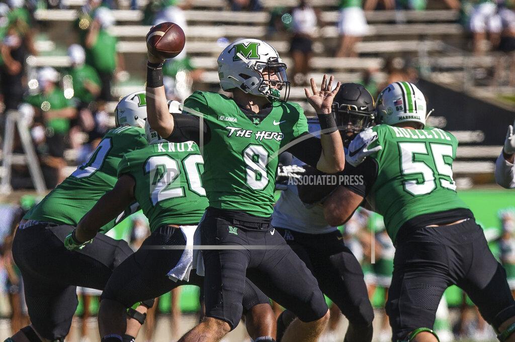 Sholten Singer Marshall quarterback Grant Wells (8) makes a throw against Appalachian State during an NCAA college football game Saturday, Sept. 19, 2020, in Huntington, W.Va. (Sholten Singer/The Herald-Dispatch via AP)