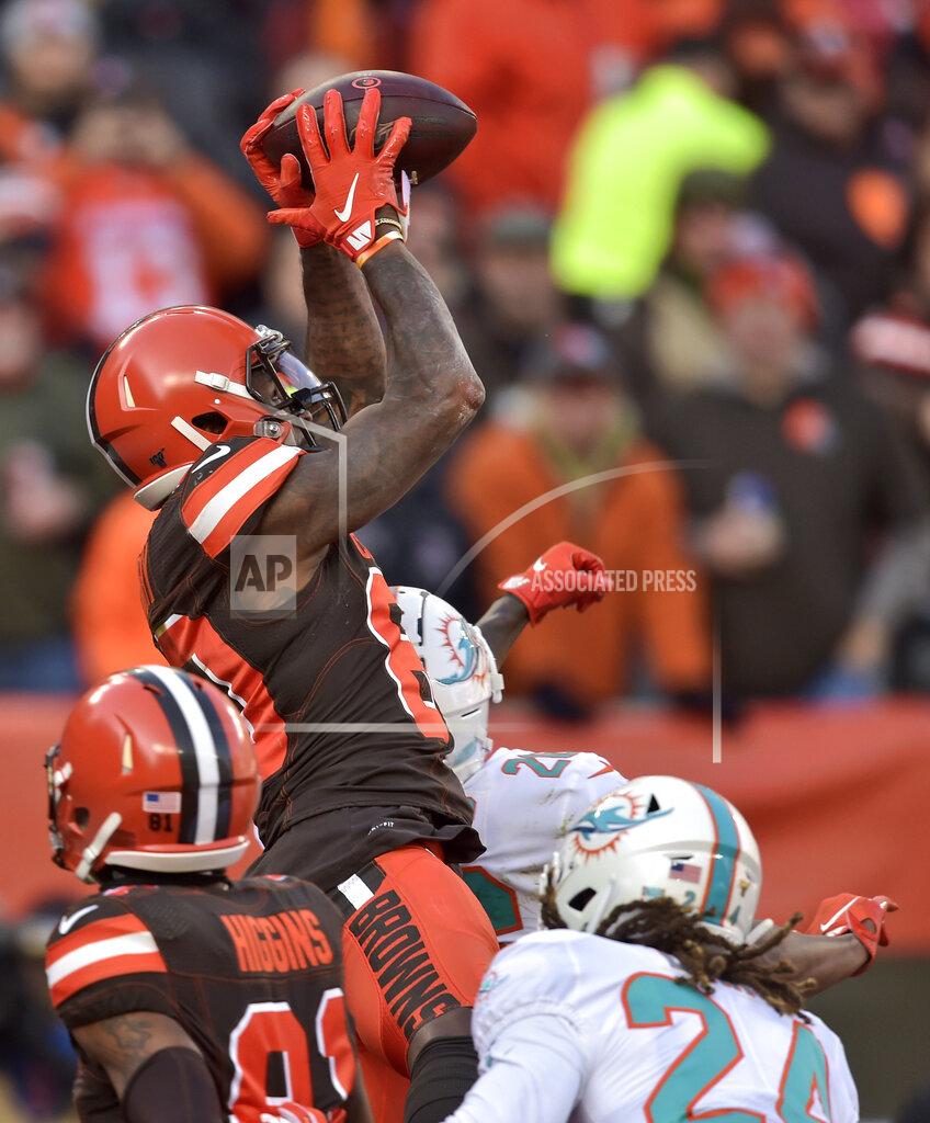 David Richard Cleveland Browns wide receiver Jarvis Landry, top, catches a 5-yard touchdown pass during the first half of an NFL football game against the Miami Dolphins, Sunday, Nov. 24, 2019, in Cleveland. (AP Photo/David Richard)