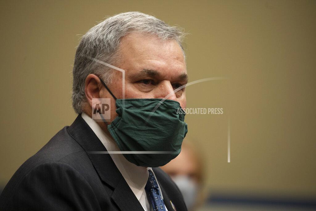 Internal Revenue Service Commissioner Charles Rettig prepares to testify before a House Committee on Oversight and Reform hearing on Wednesday, Oct. 7, 2020, in Washington. (Tasos Katopodis/Pool via AP)