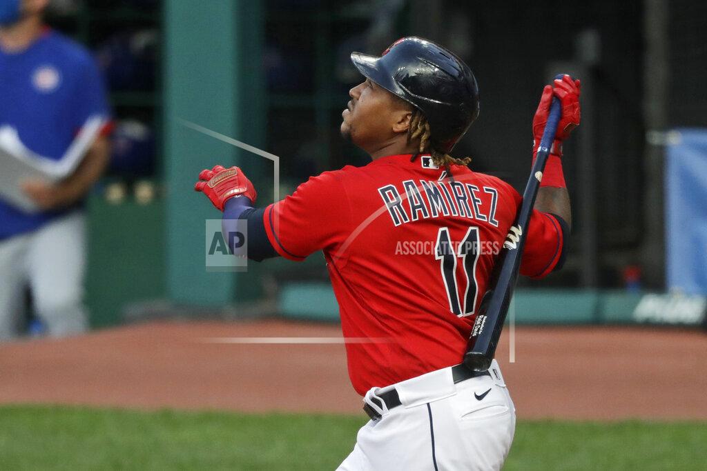 Tony Dejak Cleveland Indians' Jose Ramirez watches his RBI sacrifice fly in the fifth inning of the team's baseball game against the Chicago Cubs, Wednesday, Aug. 12, 2020, in Cleveland. (AP Photo/Tony Dejak)