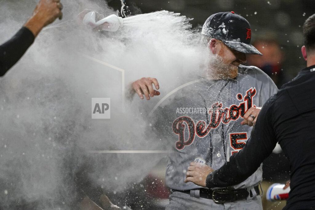Ted S. Warren Detroit Tigers starting pitcher Spencer Turnbull (56) is showered with beer and powder by teammates after Turnbull threw a no-hitter in the team's baseball game against the Seattle Mariners, Tuesday, May 18, 2021, in Seattle. The Tigers won 5-0. (AP Photo/Ted S. Warren)