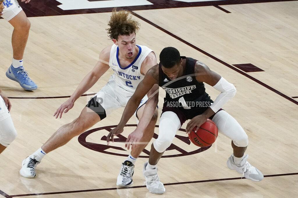 Rogelio V. Solis Mississippi State guard Iverson Molinar (1) tries to dribble past Kentucky guard Devin Askew (2) during the second half of an NCAA college basketball game in Starkville, Miss., Saturday, Jan. 2, 2021. (AP Photo/Rogelio V. Solis)