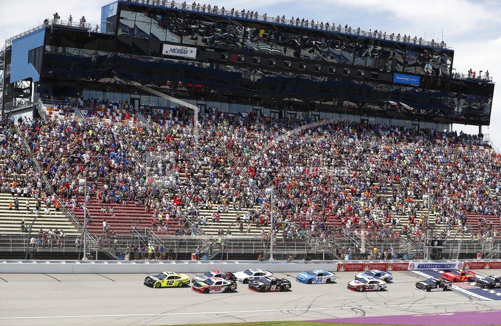 Carlos Osorio Paul Menard (12) leads the field at the start of the NASCAR Xfinity Series auto race at Michigan International Speedway, Saturday, June 8, 2019, in Brooklyn, Mich. (AP Photo/Carlos Osorio)