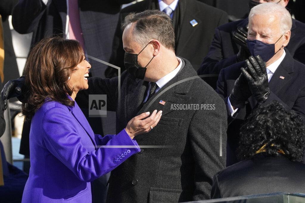 Andrew Harnik Vice President Kamala Harris hugs her husband Doug Emhoff after being sworn in as vice president by Supreme Court Justice Sonia Sotomayor during the 59th Presidential Inauguration at the U.S. Capitol in Washington, Wednesday, Jan. 20, 2021. (AP Photo/Andrew Harnik)