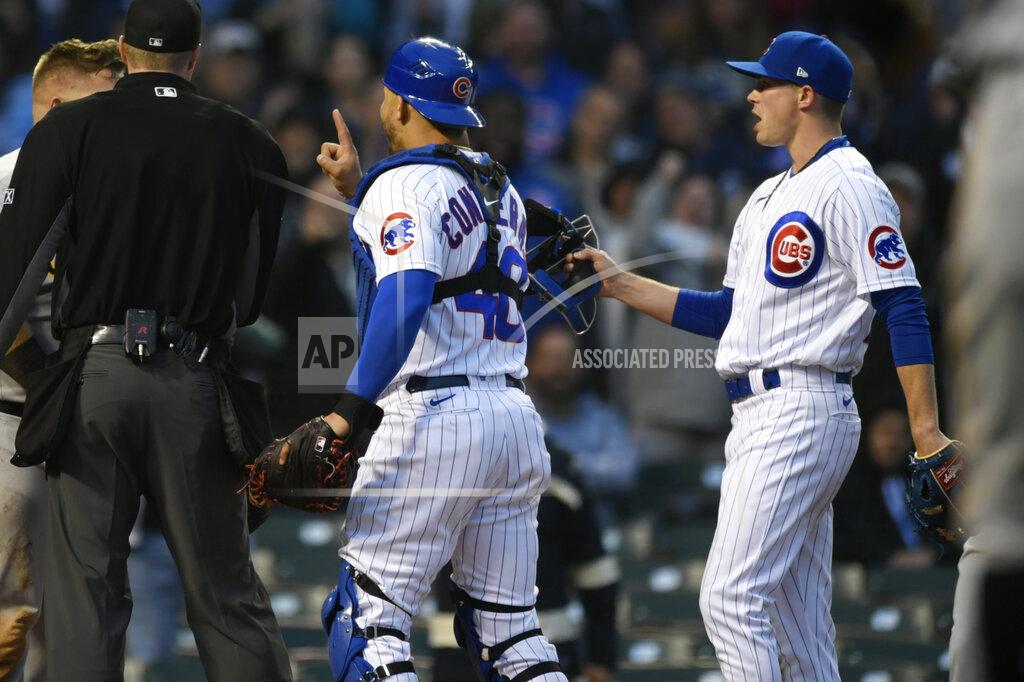 Paul Beaty Chicago Cubs catcher Willson Contreras (40) is held back by starting pitcher Keegan Thompson right, after Pittsburgh Pirates' Daniel Vogelbach (19) and Contreras collided at home plate during the fourth inning of a baseball game Tuesday, May 17, 2022, in Chicago. (AP Photo/Paul Beaty)