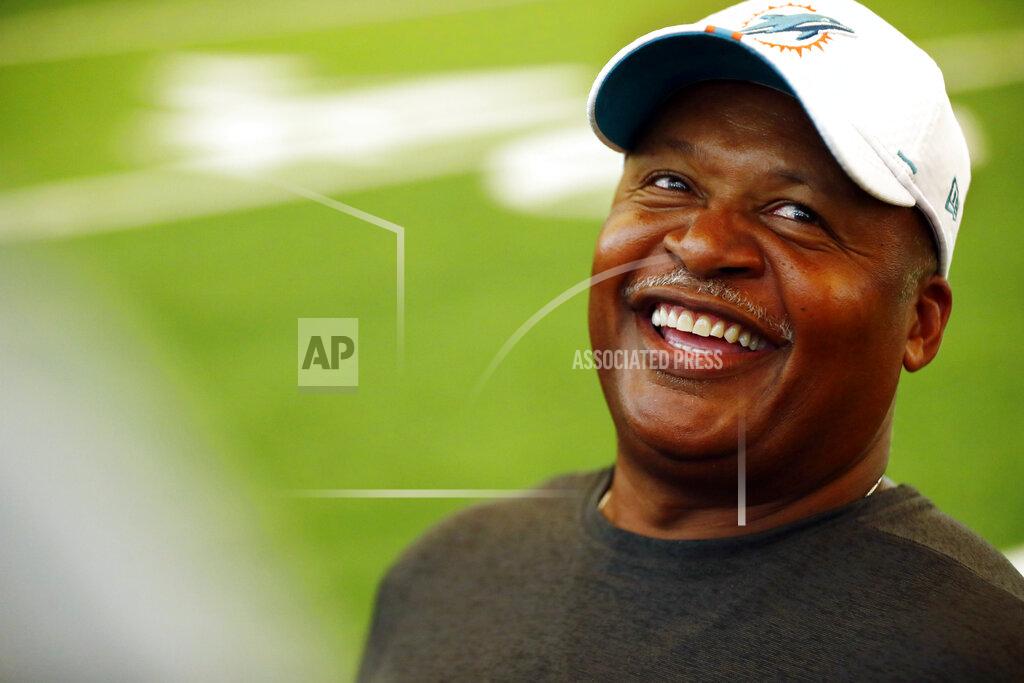 Brynn Anderson Miami Dolphins assistant head coach Jim Caldwell laughs during NFL rookie camp on Thursday, May 9, 2019, in Davie, Fla. (AP Photo/Brynn Anderson)