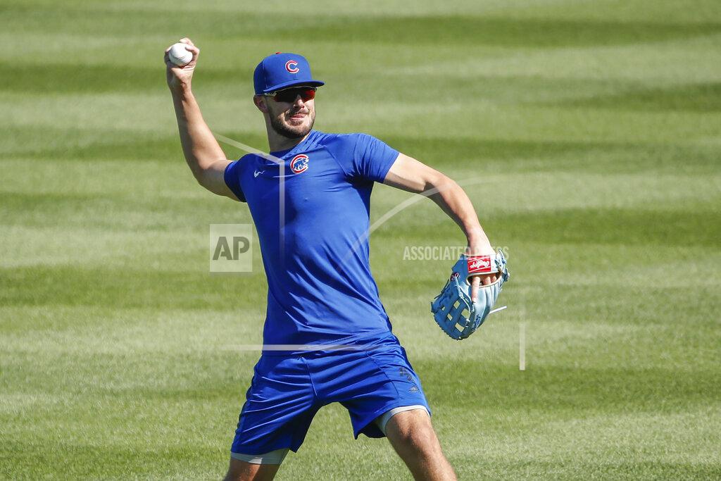 Kamil Krzaczynski Chicago Cubs third baseman Kris Bryant throws the ball during baseball practice at Wrigley Field on Friday, July 3, 2020 in Chicago. (AP Photo/Kamil Krzaczynski)