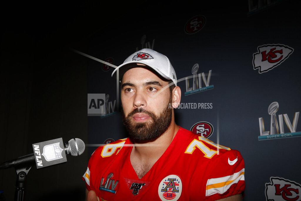 Brynn Anderson In this Wednesday, Jan. 29, 2020 photo, Kansas City Chiefs offensive guard Laurent Duvernay-Tardif (76) speaks during a news conference in Aventura, Fla., for the NFL Super Bowl 54 football game. (AP Photo/Brynn Anderson)