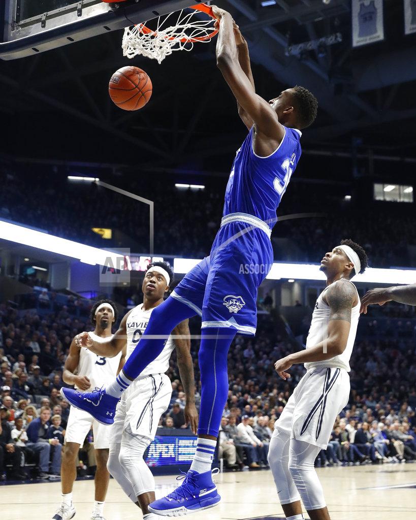 John Minchillo Seton Hall's Romaro Gill dunks during the second half of the team's NCAA college basketball game against Xavier, Wednesday, Jan. 2, 2019, in Cincinnati. (AP Photo/John Minchillo)