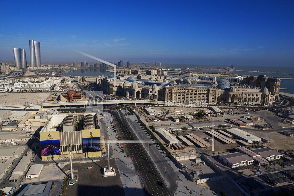 Pavel Golovkin A view of the Place Vendome mall, right, and Lusail plaza towers, left, in Lusail downtown, Qatar, Thursday, Nov. 24, 2022. (AP Photo/Pavel Golovkin)