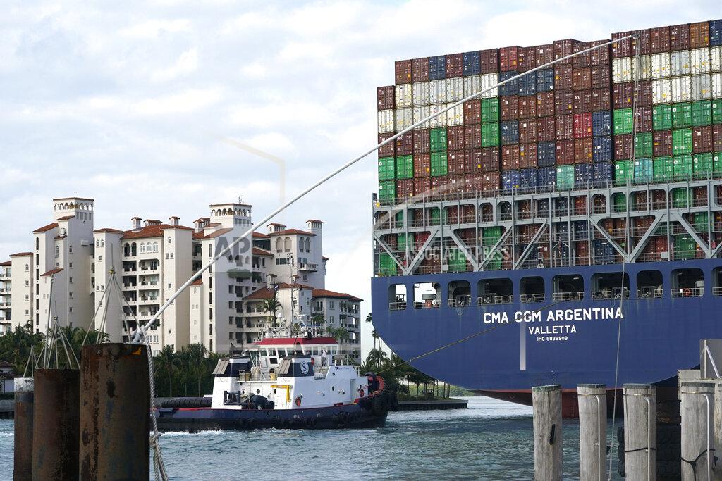 This April 6, 2021 photo shows the CMA CGM Argentina arrives at PortMiami in Miami. The U.S. economy grew at a solid 6.4% rate in the first three months of this year, setting the stage for what economists are forecasting could be the strongest year for the economy in growth led by strong consumer reporting.(AP Photo/Lynne Sladky, File)