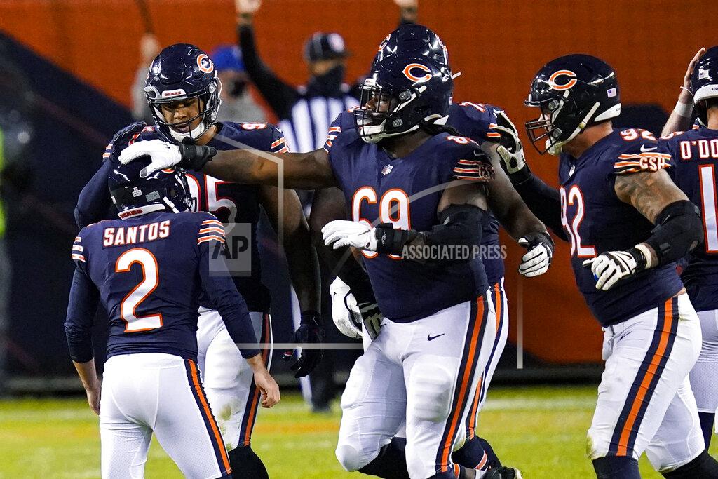 Charles Rex Arbogast Chicago Bears kicker Cairo Santos (2) is congregated by teammates after the go-ahead field goal against the Tampa Bay Buccaneers during the second half of an NFL football game in Chicago, Thursday, Oct. 8, 2020. The Bears won 20-19. (AP Photo/Charles Rex Arbogast)