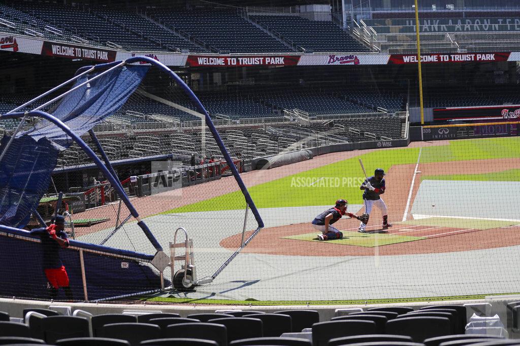 Brynn Anderson Atlanta Braves' Marcell Ozuna bats during baseball team practice at Truist Park on Friday, July 3, 2020, in Atlanta. (AP Photo/Brynn Anderson)
