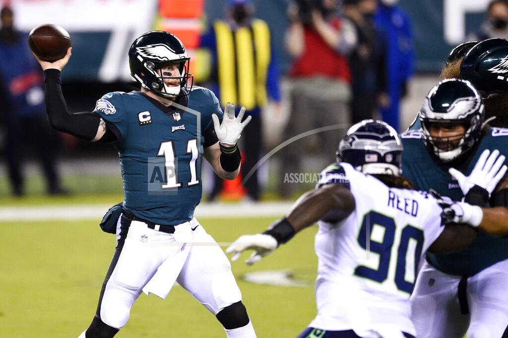 Derik Hamilton Philadelphia Eagles' Carson Wentz passes during the first half of an NFL football game against the Seattle Seahawks, Monday, Nov. 30, 2020, in Philadelphia. (AP Photo/Derik Hamilton)