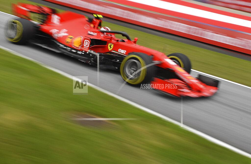 Joe Klamar In this image taken with a slow shutter speed, Ferrari driver Charles Leclerc of Monaco steers his car during the first practice session at the Red Bull Ring racetrack in Spielberg, Austria, Friday, July 3, 2020. The Austrian Formula One Grand Prix will be held on Sunday. (Joe Klamar/Pool via AP)