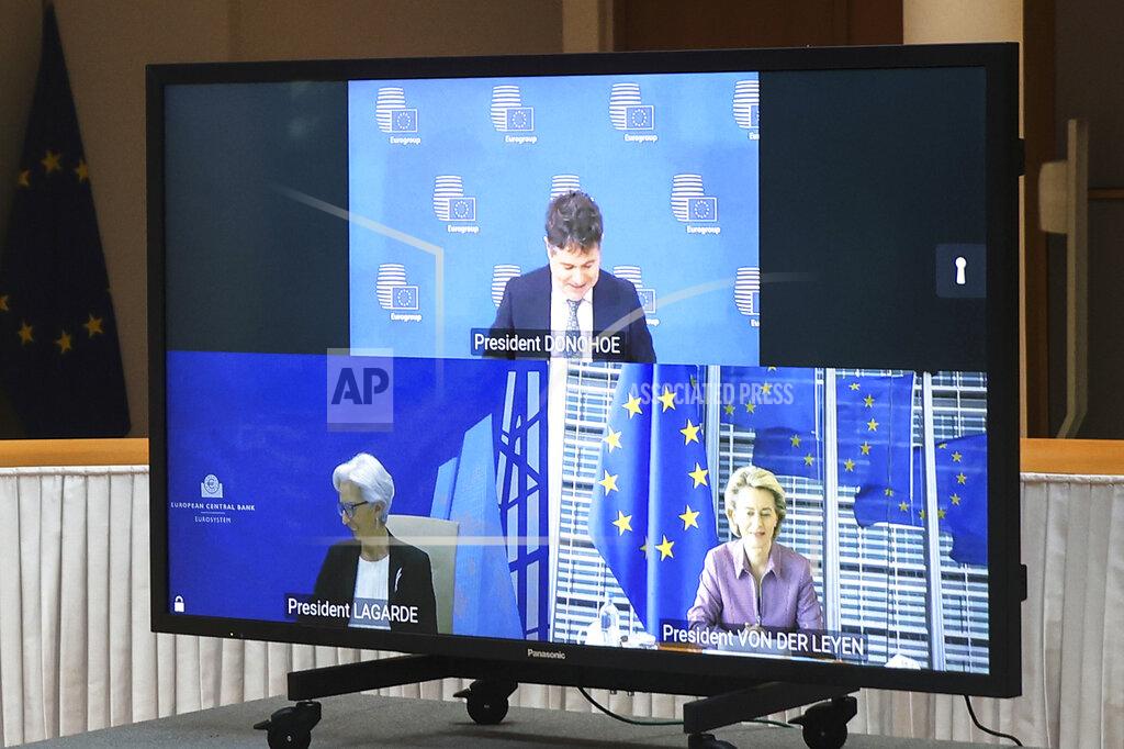 Aris Oikonomou Eurogroup President Paschal Donohoe, top, European Central Bank President Christine Lagarde, bottom left, and European Commission President Ursula von der Leyen join an inter-institutional actors video conference meeting with European Council President Charles Michel at the European Council headquarters in Brussels, Thursday, March 11, 2021. (Aris Oikonomou, Pool Photo via AP)