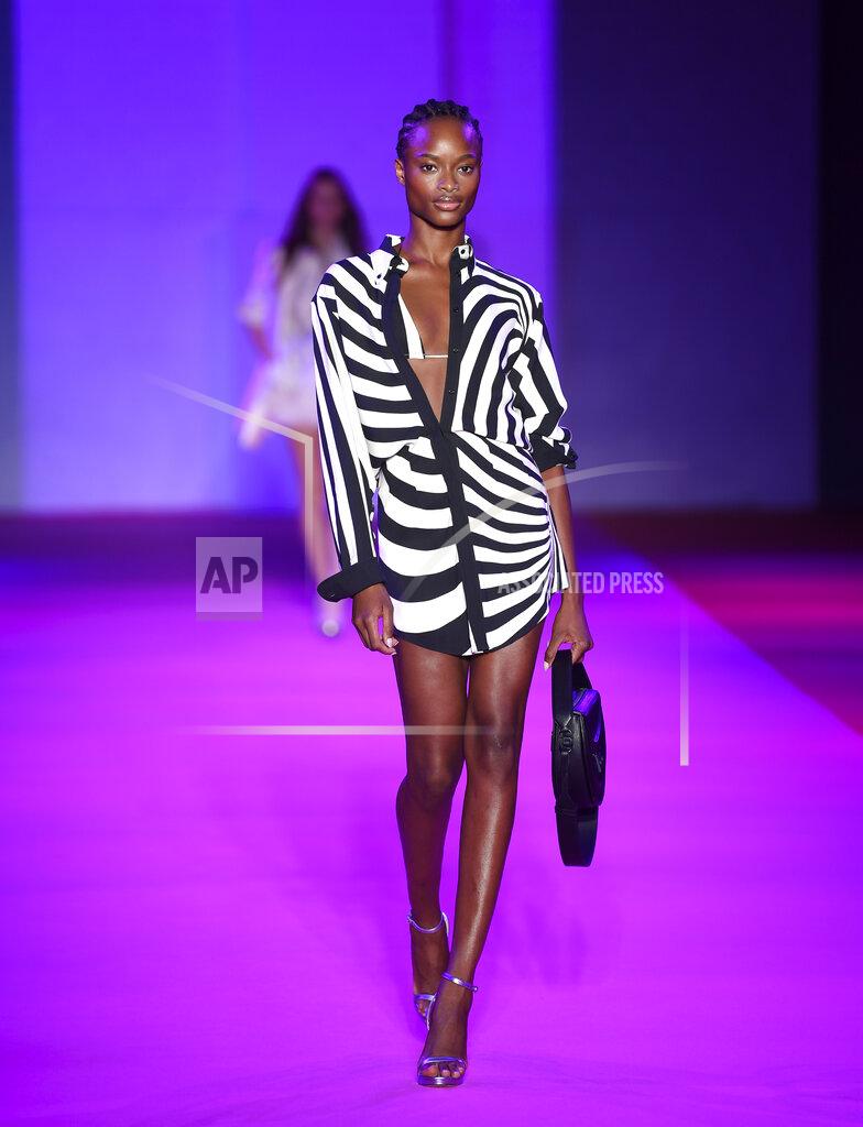 Evan Agostini A model walks the runway at the Brandon Maxwell spring/summer 2022 fashion show in the Brooklyn borough of New York during Fashion Week on Friday, Sept. 10, 2021. (Photo by Evan Agostini/Invision/AP)