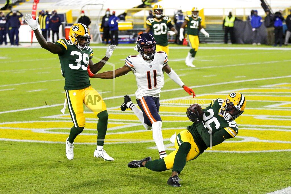 Matt Ludtke Green Bay Packers' Darnell Savage intercepts a pass in the end zone in front of Chicago Bears' Darnell Mooney during the first half of an NFL football game Sunday, Nov. 29, 2020, in Green Bay, Wis. (AP Photo/Matt Ludtke)