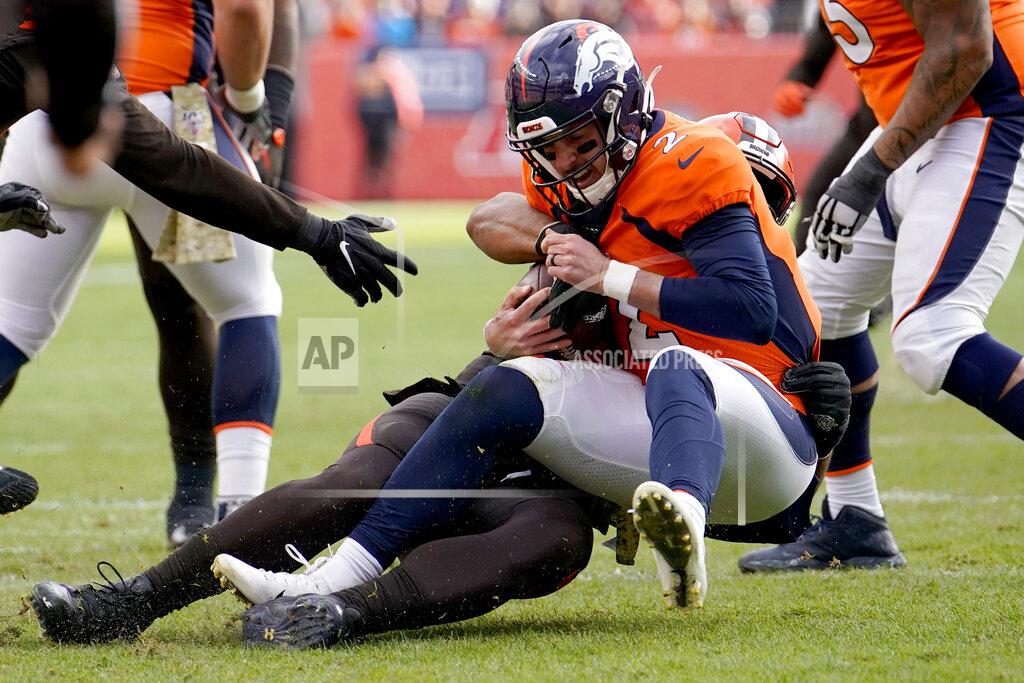 Jack Dempsey Denver Broncos quarterback Brandon Allen (2) is sacked by Cleveland Browns defensive end Olivier Vernon during the first half of NFL football game, Sunday, Nov. 3, 2019, in Denver. (AP Photo/Jack Dempsey)
