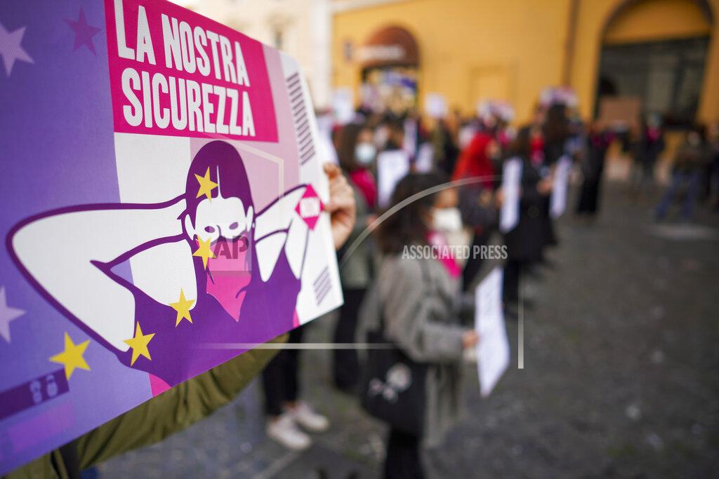 Andrew Medichini Women take part in a demonstration on the International Day for the Elimination of Violence against Women, in Rome, Wednesday, Nov. 25, 2020. (AP Photo/Andrew Medichini)