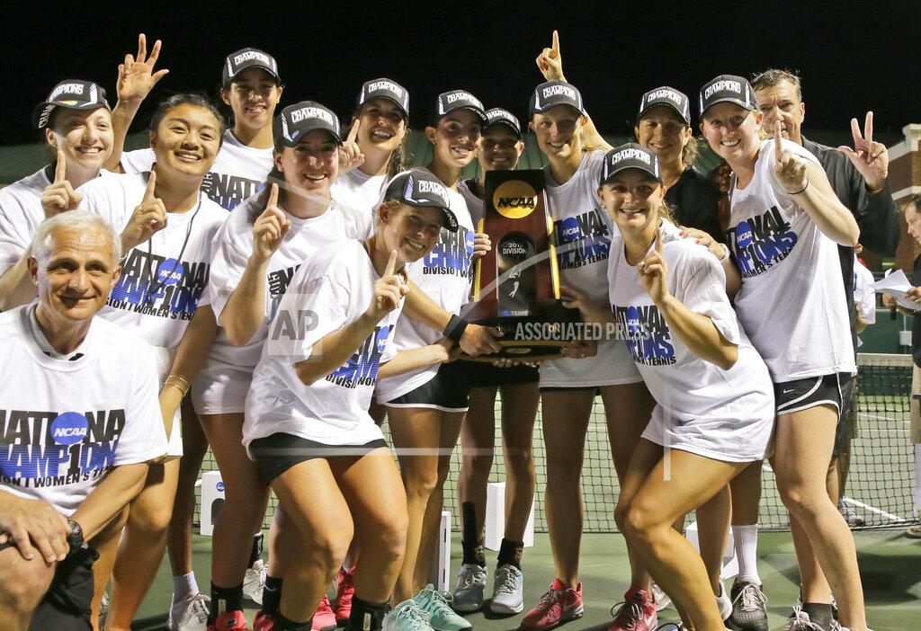 Lm Otero FILE - Vanderbilt posses with the trophy after their team won the NCAA's women's team tennis championships against Oklahoma, Tuesday, May 19, 2015, Waco, Texas. The number of women competing at the highest level of college athletics continues to rise along with an increasing funding gap between men’s and women’s sports programs, according to an NCAA report examining the 50th anniversary of Title IX. (AP Photo/LM Otero, File)