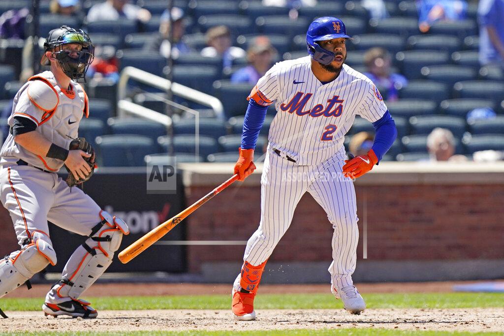 Kathy Willens New York Mets' Dominic Smith (2) and Baltimore Orioles catcher Chance Sisco watch Smith's fifth-inning RBI double in a baseball game, Wednesday, May 12, 2021, in New York. (AP Photo/Kathy Willens)