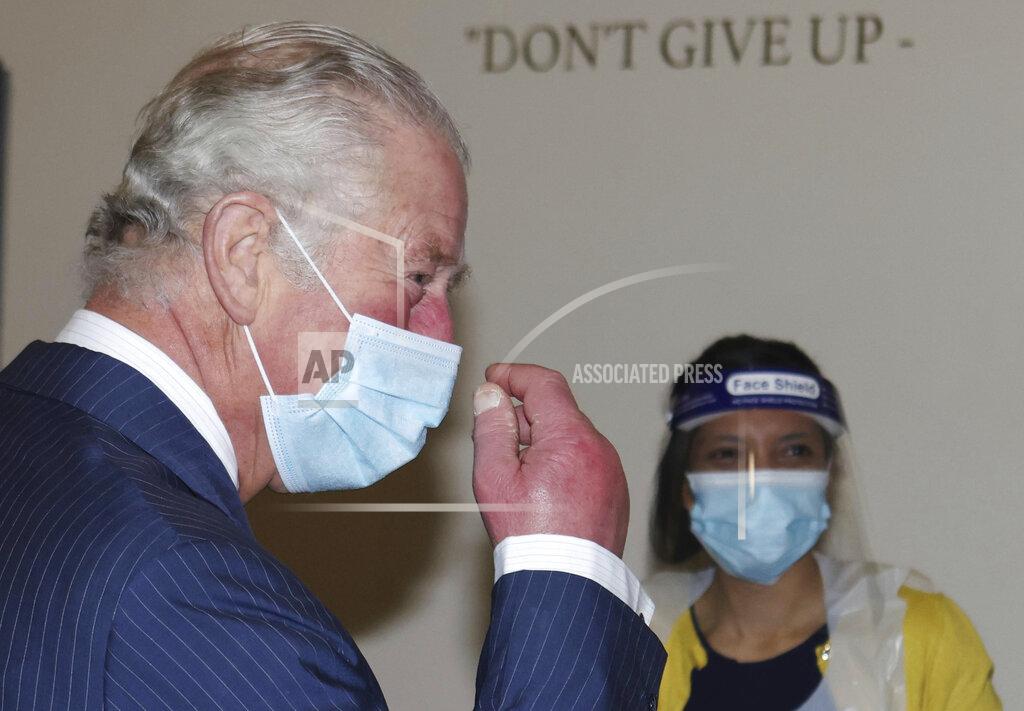 Ian Vogler Britain's Prince Charles during a visit to an NHS vaccine pop-up clinic at Jesus House church, London, Tuesday March 9, 2021, where he has been told about work to combat vaccine hesitancy and support for the community during the coronavirus pandemic. (Ian Vogler/Pool via AP)