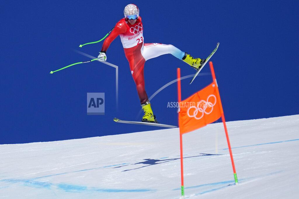 Robert F. Bukaty Stefan Rogentin, of Switzerland makes a jump during a men's downhill training run at the 2022 Winter Olympics, Thursday, Feb. 3, 2022, in the Yanqing district of Beijing. (AP Photo/Robert F. Bukaty)