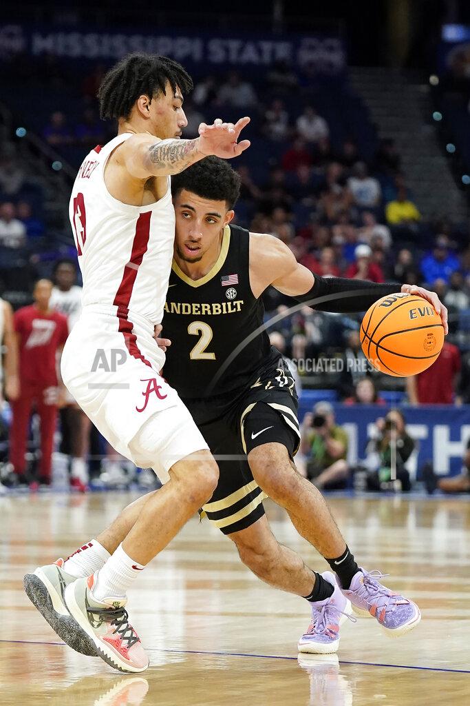 Chris O'meara Vanderbilt guard Scotty Pippen Jr. (2) drives into Alabama guard Jahvon Quinerly (13) during the second half of an NCAA men's college basketball Southeastern Conference tournament game Thursday, March 10, 2022, in Tampa, Fla. (AP Photo/Chris O'Meara)