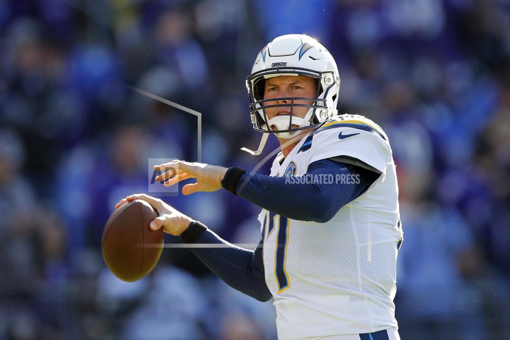 Carolyn Kaster Los Angeles Chargers quarterback Philip Rivers warms up before an NFL wild card playoff football game against the Baltimore Ravens, Sunday, Jan. 6, 2019, in Baltimore. (AP Photo/Carolyn Kaster)