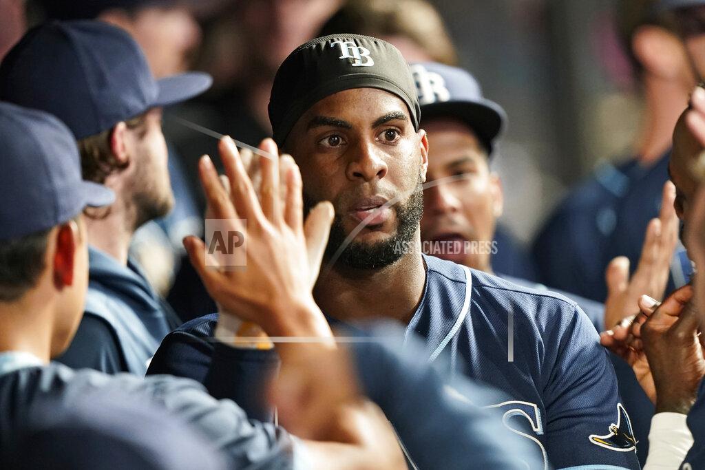 Tony Dejak Tampa Bay Rays' Yandy Diaz celebrates with teammates after hitting a solo home run in the ninth inning of a baseball game against the Cleveland Indians, Thursday, July 22, 2021, in Cleveland. (AP Photo/Tony Dejak)
