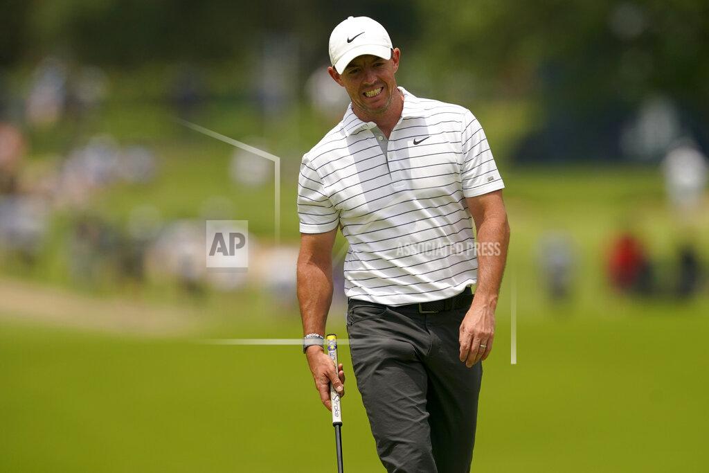 Matt York Rory McIlroy, of North Ireland, reacts after missing a putt on the =7th hole during a practice round for the PGA Championship golf tournament, Tuesday, May 17, 2022, in Tulsa, Okla. (AP Photo/Matt York)