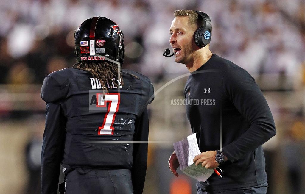 Brad Tollefson FILE - In this Saturday, Nov. 3, 2018, file photo, Texas Tech coach Kliff Kingsbury talks to quarterback Jett Duffey (7) during a timeout in the second half of an NCAA college football game against Oklahoma in Lubbock, Texas. Duffey is expected to get his second start on Saturday against Texas. (AP Photo/Brad Tollefson, File)