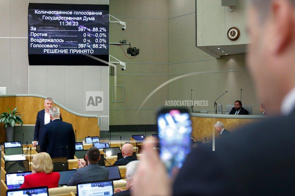 Uncredited In this handout photo provided by The State Duma, The Federal Assembly of The Russian Federation, Russian lawmakers attend a session of the State Duma, the Lower House of the Russian Parliament in Moscow, Russia, Thursday, Nov. 24, 2022. Russian lawmakers have given their final approval to a bill that significantly expands restrictions on activities seen as promoting LGBTQ rights in the country. (The State Duma, The Federal Assembly of The Russian Federation via AP)