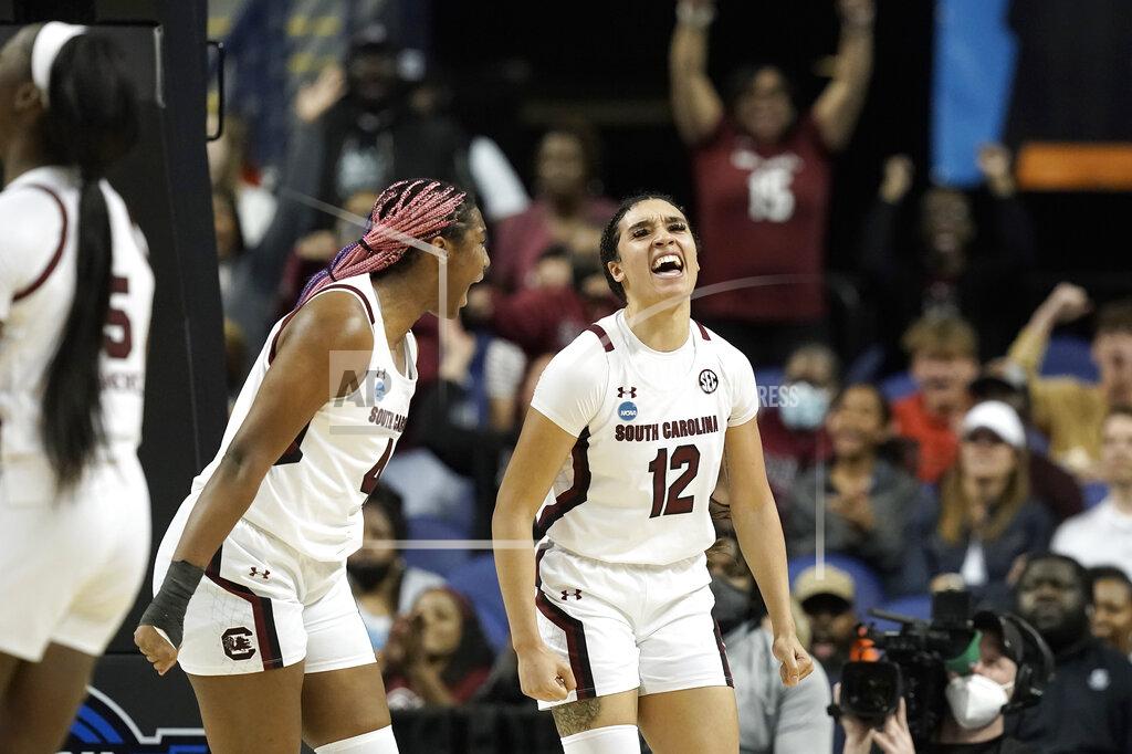 Gerry Broome South Carolina forward Aliyah Boston (4) and guard Brea Beal (12) react during the first half of a college basketball game against Creighton in the Elite 8 round of the NCAA tournament in Greensboro, N.C., Sunday, March 27, 2022. (AP Photo/Gerry Broome)