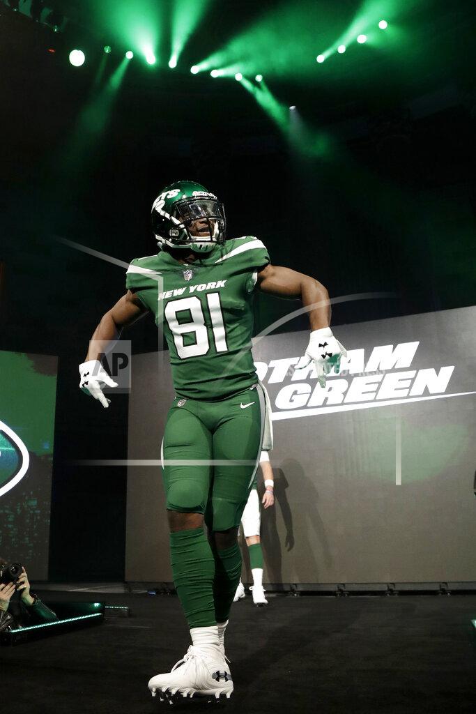 Julio Cortez New York Jets wide receiver Quincy Enunwa models the NFL football team's new "Gotham green" uniform Thursday, April 4, 2019, in New York. (AP Photo/Julio Cortez)
