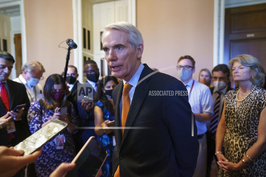 J. Scott Applewhite Sen. Rob Portman, R-Ohio, the lead GOP negotiator on the infrastructure talks, talks to reporters as he announces a $1 trillion infrastructure agreement with Democrats and is ready to vote to take up the bill, at the Capitol in Washington, Wednesday, July 28, 2021. (AP Photo/J. Scott Applewhite)